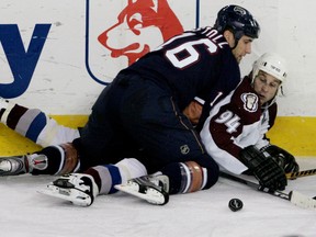 November 22, 2007. Edmonton Oilers Jarret Stoll (16) checks Colorado Avalanche and ex-Oiler Ryan Smyth during the first period of NHL play at Rexall Place in Edmonton, Alta., on Thursday November 22, 2007. Edmonton Su