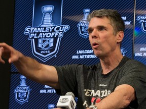 Ottawa Senators head coach Dave Cameron listens to questions from the media during an optional skate day at Canadian Tire Centre in Ottawa, Ont. on Saturday April 18, 2015. 
Errol McGihon/Ottawa Sun/Postmedia Network