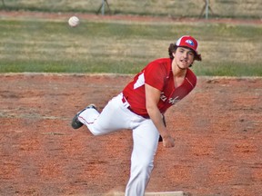 Matthew Duncan hurls a pitch towards the plate during the first home game of the season for the Matthew Halton Hawks. The Hawks have soared to a 2-0 start early in the 2015 season with wins over Kainai and Picture Butte. Greg Cowan photos/Pincher Creek Echo.