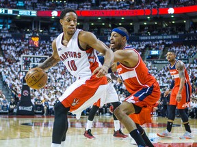 The Wizards’ Paul Pierce was not giving Raptor DeMar DeRozan much room on Saturday. (ERNEST DOROSZUK/TORONTO SUN)