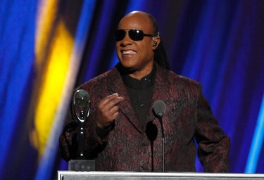 Musician Stevie Wonder inducts Bill Withers during the 2015 Rock and Roll Hall of Fame Induction Ceremony in Cleveland, Ohio April 18, 2015. REUTERS/Aaron Josefczyk