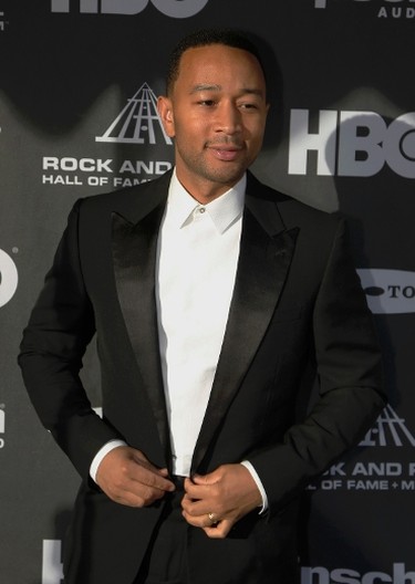 Singer John Legend poses as he arrives ahead of the 2015 Rock and Roll Hall of Fame Induction Ceremony in Cleveland, Ohio April 18, 2015. REUTERS/Aaron Josefczyk