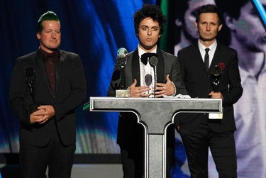 Green Day singer Billie Joe Armstrong speaks as his band is inducted during the 2015 Rock and Roll Hall of Fame Induction Ceremony in Cleveland, Ohio April 18, 2015. REUTERS/Aaron Josefczyk