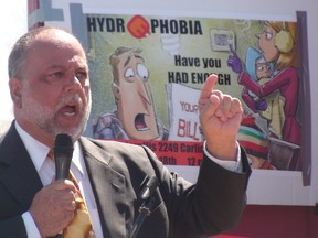 NDP MPP Gilles Bisson rails against the Ontario government's plan to privatize hydro at a rally Saturday outside Energy Minister Bob Chiarelli's Carling Ave. constituency office.
AEDAN HELMER / OTTAWA SUN/POSTMEDIA NETWORK