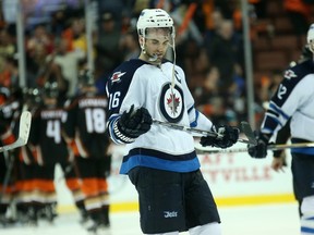 ANAHEIM, CA - APRIL 18: Andrew Ladd #16 of the Winnipeg Jets reacts as he skates off the ice after the final horn of against the Anaheim Ducks in Game Two of the Western Conference Quarterfinals during the 2015 NHL Stanley Cup Playoffs at Honda Center on April 18, 2015 in Anaheim, California. The Ducks won 2-1.  Stephen Dunn/Getty Images/AFP