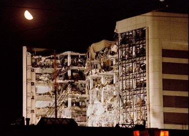 The moon hangs over the wreckage of the Alfred P. Murrah Federal Building after a 1200 pound truck bomb blew off the north side of the building in downtown Oklahoma City, in this file photo taken April 21, 1995. Sunday marks the 20th anniversary of the bombing - the nation's worst act of domestic terrorism - that killed 168 people.  Anti-government militant Timothy McVeigh, who conceived and carried out the attack, was executed in 2001. His accomplice Terry Lynn Nichols is in prison for life.  REUTERS/Staff/Files