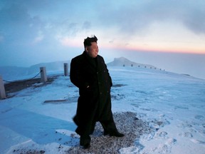 North Korean leader Kim Jong Un views the dawn from the summit of Mt Paektu April 18, 2015, in this photo released by North Korea's Korean Central News Agency (KCNA) on April 19, 2015. REUTERS/KCNA