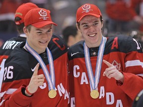 Curtis Lazar and Connor McDavid of Team Canada are all smiles after winning gold at the World Junior Championships. Lazar knows McDavid will fit it nicely if he ends up in Edmonton. Claus Andersen/Getty Images/AFP