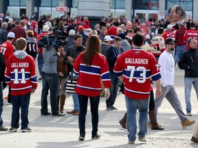 Ottawa Senators and Montreal Canadiens fans enjoy the festivities before game three outside of the Canadian Tire Centre in Ottawa Sunday April 19, 2015. Tony Caldwell/Postmedia Network