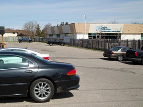 Police are investigating a shooting early Saturday of a man in this parking lot near Golddiggers strip club at 2010 Dundas St. (MIKE HENSEN, The London Free Press)