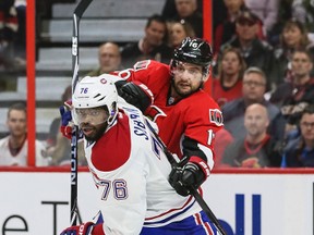 Ottawa Senators Clarke MacArthur battles with Montreal Canadiens P.K. Subban during NHL hockey action at the Canadian Tire Centre in Ottawa, Ontario on April 19, 2015. Errol McGihon/Ottawa Sun/QMI Agency