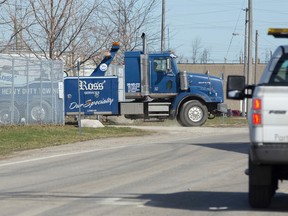 A two truck leaves the yard at Ross' Services on Pond Mills Road in London, Ont. on Wednesday April 15, 2015. The towing service has a contract with the London Police Service which competing tow companies say puts them at risk. (CRAIG GLOVER, The London Free Press)