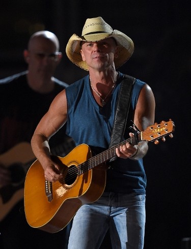 Honoree Kenny Chesney performs onstage during the 50th Academy Of Country Music Awards at AT&T Stadium on April 19, 2015 in Arlington, Texas.   Ethan Miller/Getty Images for dcp/AFP