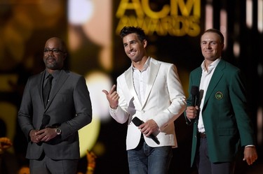 (L-R) Musicians Darius Rucker, Jake Owen and professional golfer Jordan Spieth speak onstage during the 50th Academy Of Country Music Awards at AT&T Stadium on April 19, 2015 in Arlington, Texas.   Ethan Miller/Getty Images for dcp/AFP