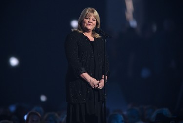 Andrea Swift speaks onstage during the 50th Academy Of Country Music Awards at AT&T Stadium on April 19, 2015 in Arlington, Texas.   Cooper Neill/Getty Images for dcp/AFP