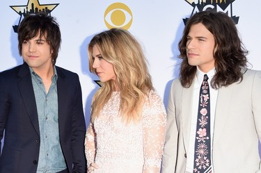 (L-R) Musicians Neil Perry, Kimberly Perry and Reid Perry of The Band Perry attend the 50th Academy Of Country Music Awards at AT&T Stadium on April 19, 2015 in Arlington, Texas.   Jason Merritt/Getty Images/AFP