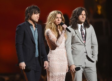 Recording artists Neil Perry, Kimberly Perry, and Reid Perry of The Band Perry present the award for Vocal Duo of the Year onstage during the 50th Academy Of Country Music Awards at AT&T Stadium on April 19, 2015 in Arlington, Texas.   Cooper Neill/Getty Images for dcp/AFP