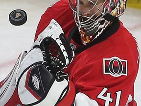Ottawa Senators Craig Anderson makes a save against the Montreal Canadiens during third period action at the Canadian Tire Centre in Ottawa Sunday April 19, 2015. Tony Caldwell/Postmedia Network