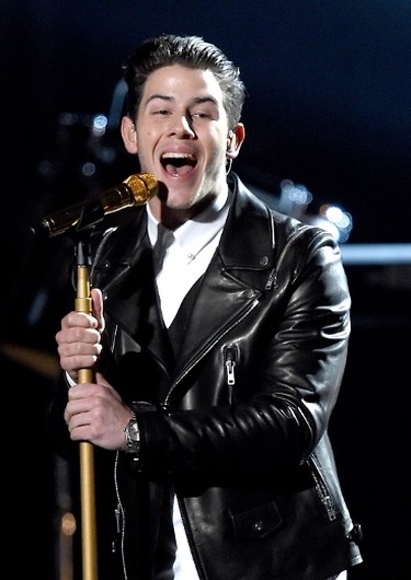 Singer/actor Nick Jonas performs onstage during the 50th Academy Of Country Music Awards at AT&T Stadium on April 19, 2015 in Arlington, Texas.   Ethan Miller/Getty Images for dcp/AFP