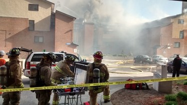 Fire crews battled a four-alarm fire Saturday at a Deerfield Dr. housing complex. About 75 people have been left homeless. (ORLANDO BLACKSMITH Submitted images Ottawa Sun / Postmedia Network)