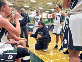 Lambton Lions women's basketball coach Pete Kaija, shown here addressing his team during a game in 2012, will not be back next season. The coach and the school encountered differences regarding how to proceed and decided to go their separate ways March 31. DAVE PAUL / THE OBSERVER / POSTMEDIA NETWORK