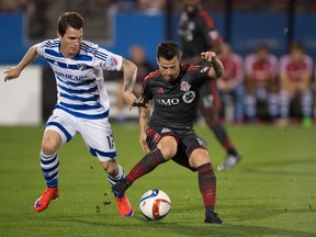 FC Dallas defender Zach Loyd (17) and Toronto FC midfielder Sebastian Giovinco (10) chase the ball during the first half at Toyota Stadium. (Jerome Miron-USA TODAY Sports)