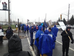 Teachers on picket line Durham school board headquarters in Whitby Monday, April 20, 2015. (Maryam Shah/Toronto Sun)