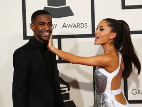 Big Sean and singer Ariana Grande arrive at the 57th annual Grammy Awards in Los Angeles, California February 8, 2015.  (REUTERS/Mario Anzuoni)