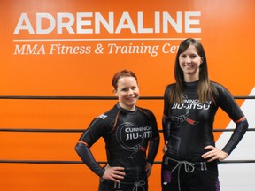 Kari Gough (left) and Stef Doyle (right) run a women’s only jiu jitsu class at Adrenaline MMA Training and Fitness, April 16, 2015. MIRANDA BRUMWELL\SPECIAL TO THE LONDONER\POSTMEDIA NETWORK