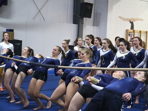 Gymnasts take part in the limbo following NOSSA gymnastics at the GymZone in Sudbury, Ont. on Monday April 20, 2015.