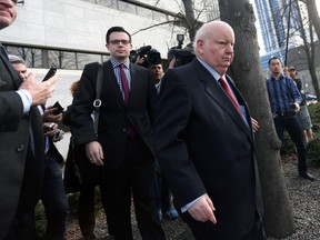 Senator Mike Duffy leaves the Ottawa Courthouse on the Apr. 16, 2015 after day eight of testimony in the trial relating to his Senate expense claims. Andrew Meade/ Ottawa Sun/ Postmedia Network