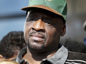 Floyd Dent takes part in a protest against police brutality outside the Inkster Police Department in Inkster, Mich., April 1, 2015. (REBECCA COOK/Reuters)