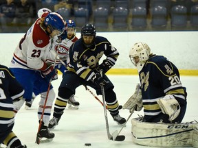 Kingston Voyageurs' Alex Stothart takes a shot on Toronto Patriots goalie Mathew Robson during Game 6 of the Ontario Junior Hockey League Buckland Cup final at the Invista Centre on Monday. (James Paddle-Grant/For The Whig-Standard)