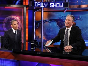 U.S. President Barack Obama, left, participates in a taping of the Daily Show with Jon Stewart at the Comedy Central Studios in New York, October 18, 2012. (REUTERS/Jason Reed/Files)