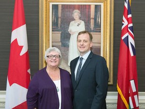 2015 June Callwood Award recipient Cathy Grondin (left) poses with Elgin-Middlesex-London MPP Jeff Yurek at the award ceremony in Toronto on April 14.