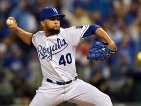 Kansas City Royals relief pitcher Kelvin Herrera throws against the San Francisco Giants during Game 7 of the 2014 World Series at Kauffman Stadium. (Peter G. Aiken/USA TODAY Sports)