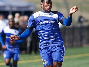 Edmonton defender Eddie Edward (3) heads the ball during a FC Edmonton and Fort Lauderdale Strikers North American Soccer League game at Clarke Stadium during in Edmonton, Alta., on Sunday April 19, 2015. Ian Kucerak/Edmonton Sun/Postmedia Network