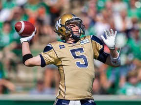 Drew Willy #5 of the Winnipeg Blue Bombers attempts a pass in a game between the Winnipeg Blue Bombers and Saskatchewan Roughriders in week 10 of the 2014 CFL season at Mosaic Stadium on August 31, 2014 in Regina, Saskatchewan, Canada. (Brent Just/Getty Images/AFP)