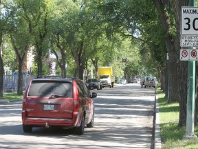 A vehicle passes a school zone speed limit sign near Dorchester School in Crescentwood. (Kevin King/Winnipeg Sun file photo)