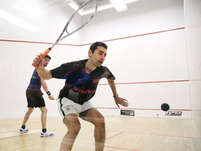 Shahier Razik, of Canada, returns a shot in a qualifying match against Albert Shoihet of Canada during second day action at the Professional Squash Association Northern Ontario Sqaush Championships on Tuesday. The event featuring 24  professional sqaush players from around the world runs all week at the YMCA, with the championship match going at 3 p.m. on Saturday. For more information, go to www.psaworldtour.com.
Gino Donato/Sudbury Star