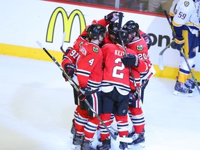 Apr 21, 2015; Chicago, IL, USA; Chicago Blackhawks left wing Brandon Saad (20) is congratulated for scoring a goal during the third period against the Nashville Predators in game four of the first round of the 2015 Stanley Cup Playoffs at the United Center. 
Dennis Wierzbicki-USA TODAY Sports
