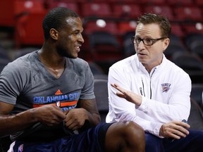 Oklahoma City Thunder coach Scott Brooks (right) talks with guard Dion Waiters before a game against the Sacramento Kings at Sleep Train Arena. (Kelley L Cox/USA TODAY Sports)