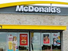 Advertising is shown at a McDonald's restaurant in Encinitas, Calif., Jan. 29, 2015.  REUTERS/Mike Blake