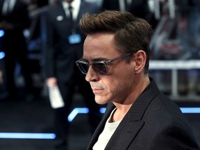 Cast member Robert Downey Jr. poses at the European premiere of "Avengers: Age of Ultron" at Westfield shopping centre, Shepherds Bush, London April 21, 2015. REUTERS/Stefan Wermuth