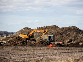 Construction equipment is pictured at the site of the new sewage lift station being installed to service the Athabasca Flats East area on Sunday April 19, 2015 in Whitecourt, Alta. 

Adam Dietrich | Whitecourt Star | Postmedia Network