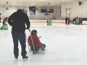 Winnipeg youth who are blind or partially sighted were given the chance to learn to skate and play hockey this season, thanks to the Courage Canada Hockey youth learn-to-skate program. Youth took part in the program on Wednesday at the Canlan Ice Sports Complex in Winnipeg. (CELLA LAO ROUSSEAU/WINNIPEG SUN/POSTMEDIA NETWORK)
