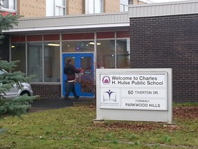 Charles H. Hulse Public School and Ottawa-Carleton District School Board staff move resources into their new, temporary school at the formerly unused Parkwood Hills Public School on Wednesday, April 22, 2015. Last week, 30 children and seven staff members at Alta Vista Dr. school were effected by the odour and complained of watery eyes, itchy ears and nausea causing the school to close and relocate. (Keaton Robbins/Ottawa Sun)