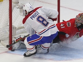 Ottawa Senators Craig Anderson makes a toe save against  Montreal Canadiens Brandon Prust during second period action at the Canadian Tire Centre in Ottawa Wednesday April 22, 2015. Tony Caldwell/Postmedia Network