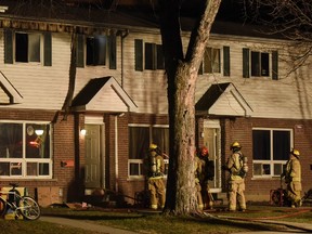 Kingston Fire and Rescue responded to 16 Compton St., just before 8:30 p.m., Wednesday. Kingston Police are now investigating the incident as a possible arson case. (James Paddle-Grant/For The Kingston Whig-Standard)