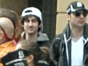 Dzhokhar Tsarnaev (white hat) in a file handout photo released through the FBI website April 18, 2013. REUTERS/FBI/Handout via Reuters/Files